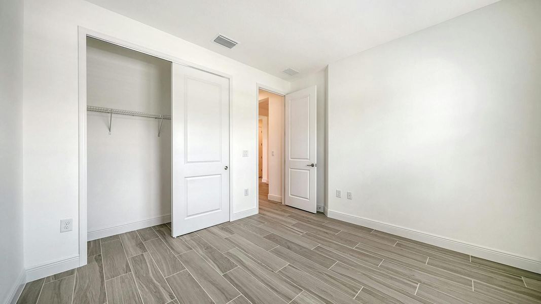 Spacious, unfurnished interior of a new home in Windward Real Estate and Homes for Sale in Sarasota, FL - Neal Communities, Lakewood Ranch (Image 35).