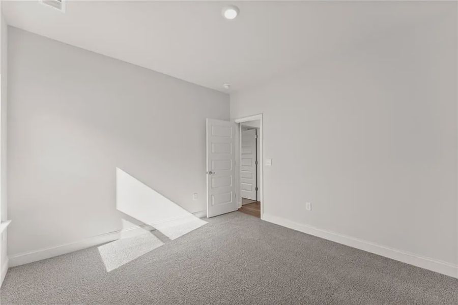 Representative unfurnished interior of a home built from the Plan 1709 by Adams Homes in Scarlett Place, Bowdon (Image 23).
