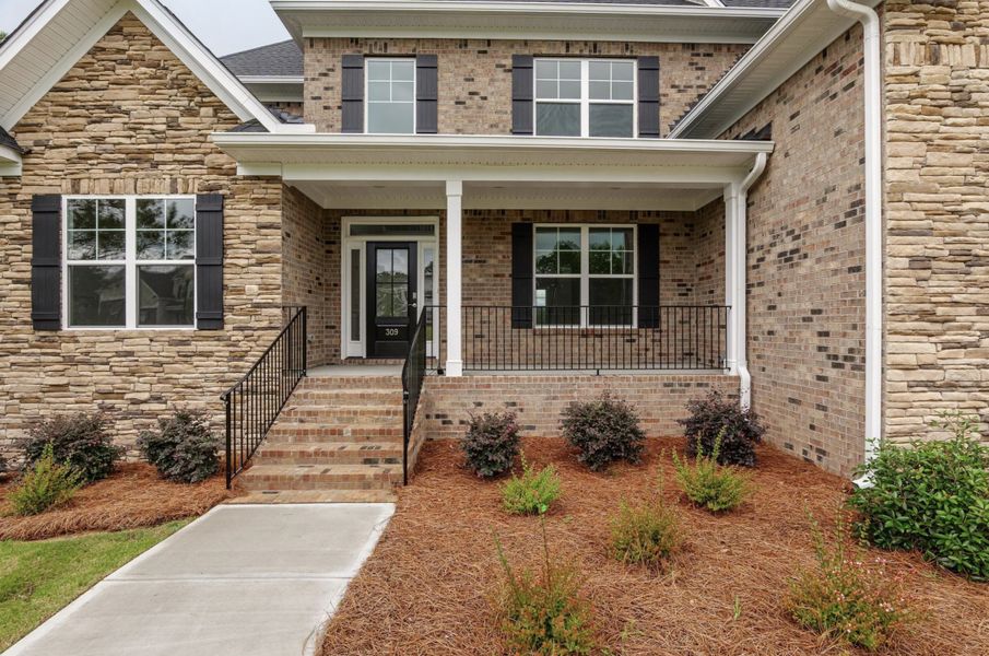 Representative exterior photo of a completed home built from the Berkeley by Hurricane Builders in Mount Vintage, North Augusta, SC (Image 23).