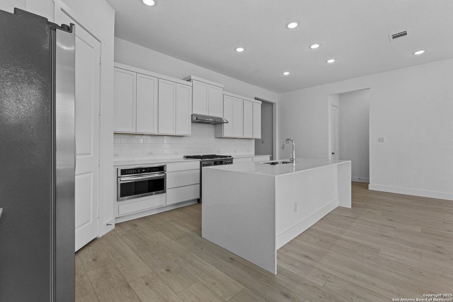 Furnished interior view inside a new home in , New Braunfels (Image 5).