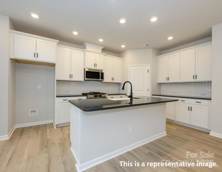 Furnished interior view inside a new home in North Creek Village, Huntersville (Image 3).