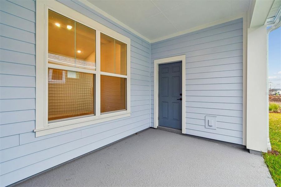 Exterior details and patio area of a home in Laureate Park at Lake Nona - Garden Series, Orlando (Image 17).