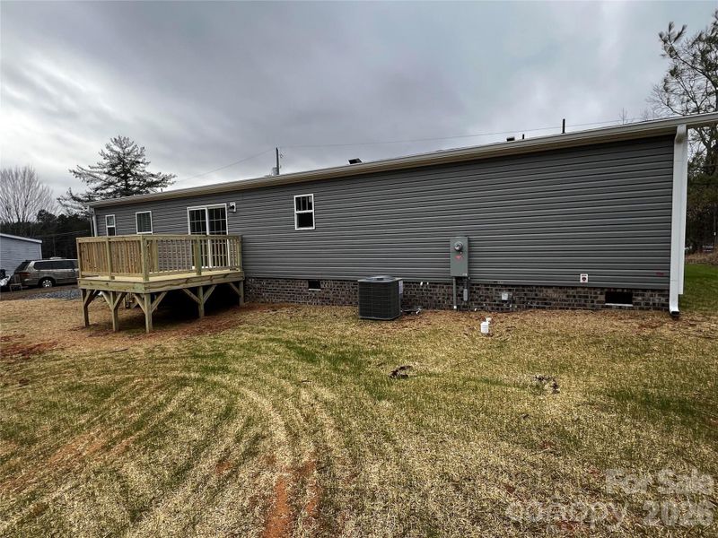 Exterior details and patio area of a home in , Troutman (Image 10). Exterior details and patio area of a home in , Troutman (Image 10).