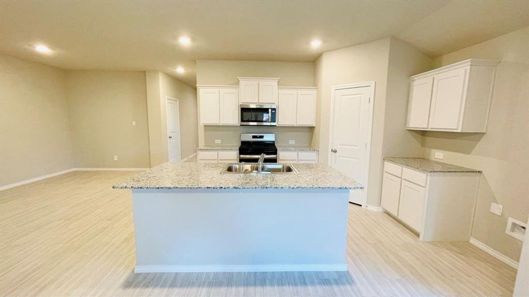 Kitchen - All Home and community information, including pricing, included features, terms, availability and amenities, are subject to change at any time without notice or obligation. All Drawings, pictures, photographs, video, square footages, floor plans, elevations, features, colors and sizes are approximate for illustration purposes only and will vary from the homes as built. Kitchen - All Home and community information, including pricing, included features, terms, availability and amenities, are subject to change at any time without notice or obligation. All Drawings, pictures, photographs, video, square footages, floor plans, elevations, features, colors and sizes are approximate for illustration purposes only and will vary from the homes as built.