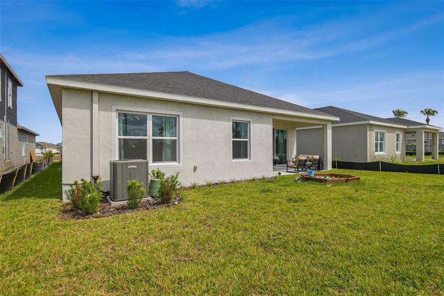 Front exterior of a new home in Waterset, Apollo Beach, FL, highlighting curb appeal (Image 30). Front exterior of a new home in Waterset, Apollo Beach, FL, highlighting curb appeal (Image 30).