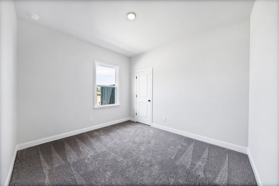Spacious, unfurnished interior of a new home in Monroe Preserve, Chapin (Image 56).