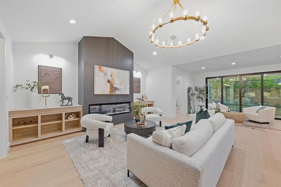 Expansive living room offers generous space for entertaining while maintaining a comfortable, inviting atmosphere.