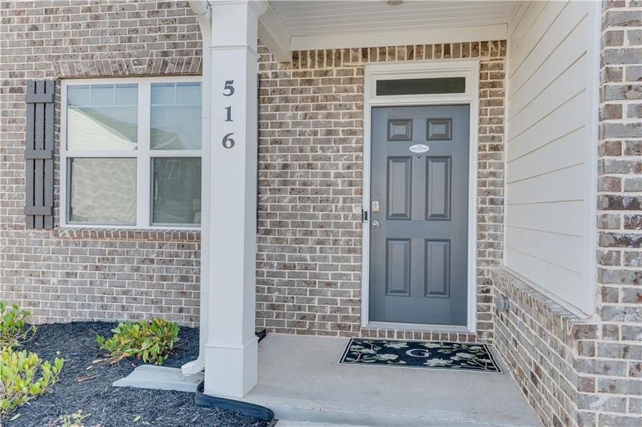 Exterior details and patio area of a home in The Reserve at Calcutta, Stockbridge (Image 27).