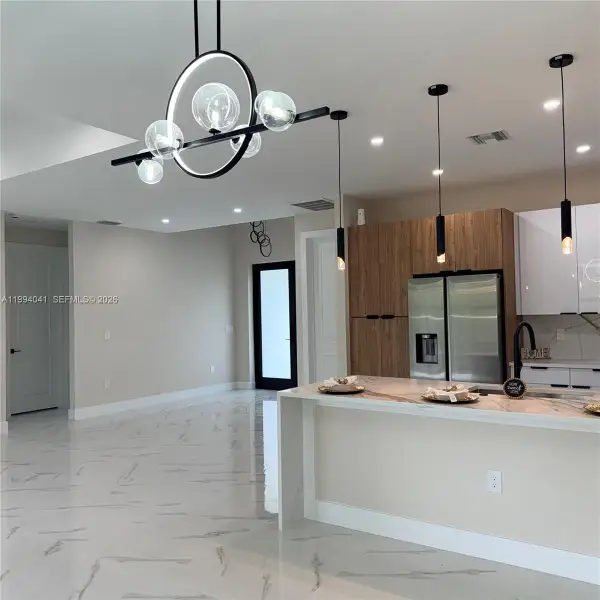 Furnished interior view inside a new home in , Lehigh Acres (Image 7).