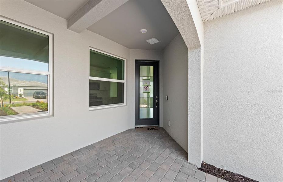 Exterior details and patio area of a home in BeachWalk by Manasota Key, Englewood (Image 3). Exterior details and patio area of a home in BeachWalk by Manasota Key, Englewood (Image 3).