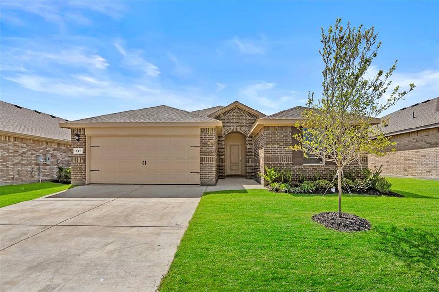 Front exterior of a new home in Meadowbrook Estates, Cleburne, TX, highlighting curb appeal (Image 17).