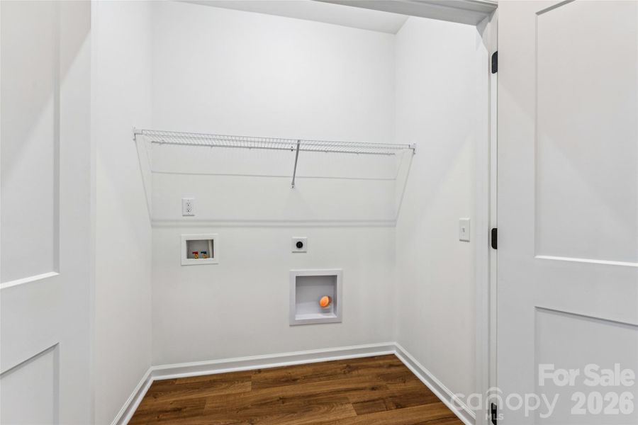 Laundry area in hall upstairs