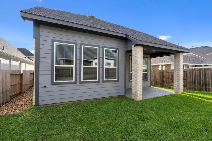 Exterior details and patio area of a home in Emory Glen, Magnolia (Image 22).