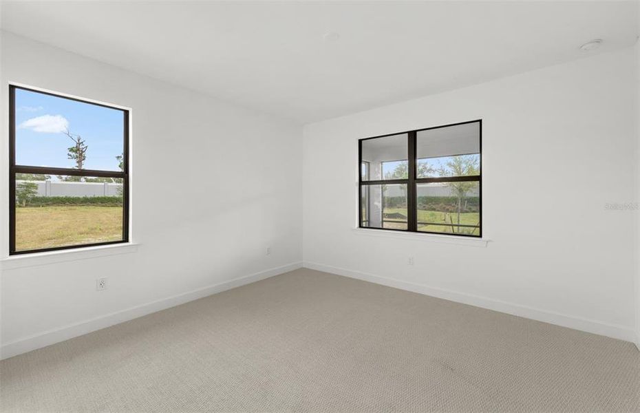 Spacious, unfurnished interior of a new home in Arbor Oaks, North Port (Image 17). Spacious, unfurnished interior of a new home in Arbor Oaks, North Port (Image 17).
