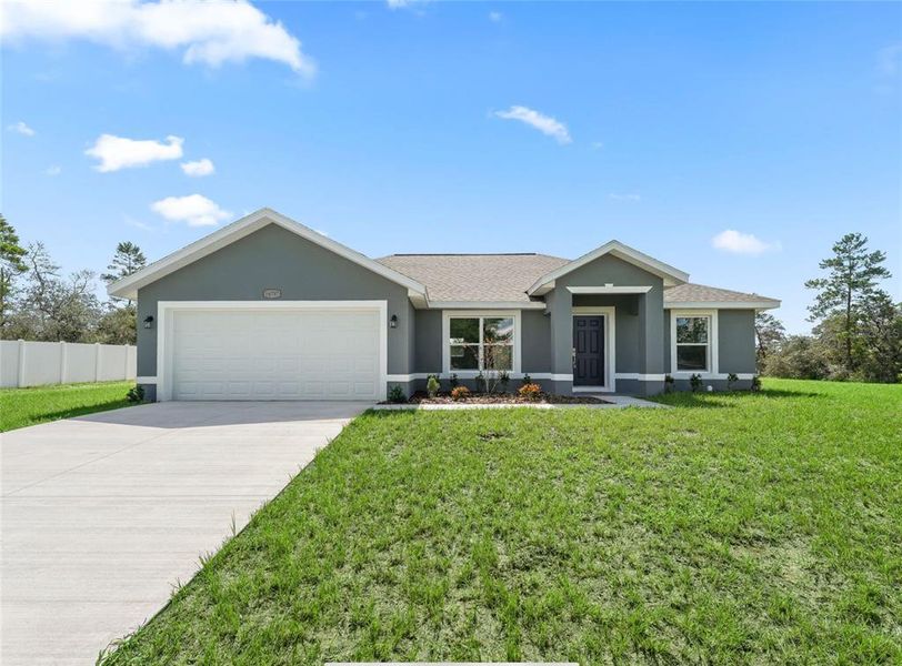Front exterior of a new home in , Ocala, FL, highlighting curb appeal (Image 21).