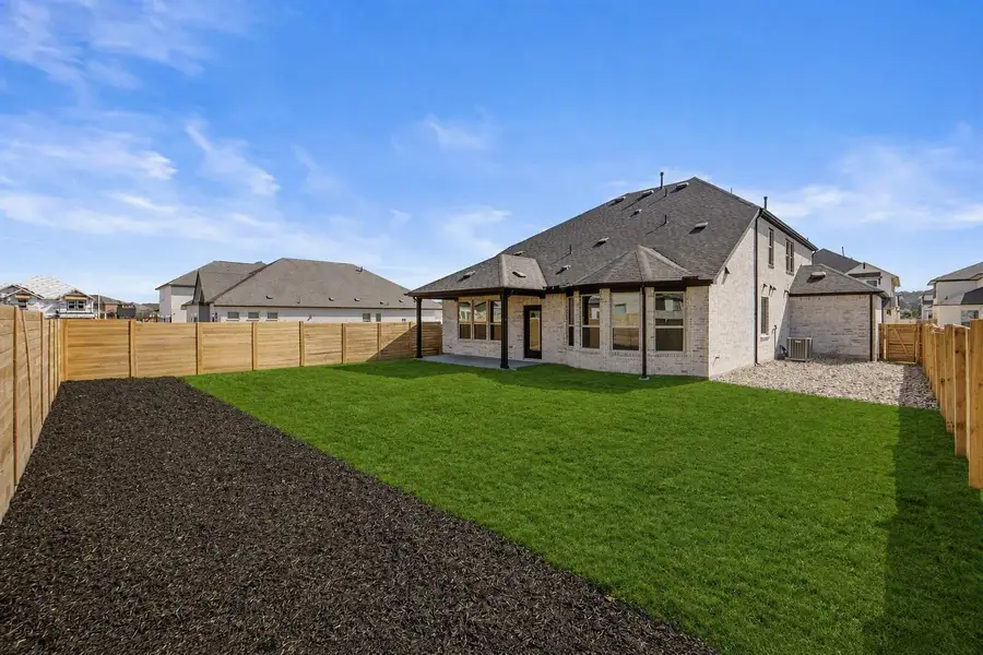 Exterior details and patio area of a home in Bluffview Reserve, Leander (Image 3).