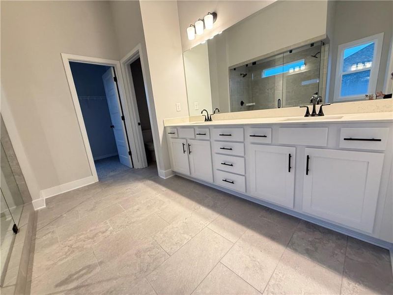 Furnished interior view inside a new home in Ponderosa Farms Manor, Gainesville (Image 12).