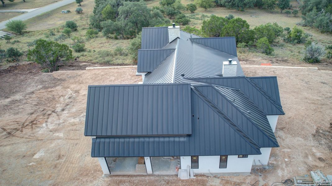 Front exterior of a new home in , New Braunfels, TX, highlighting curb appeal (Image 9). Front exterior of a new home in , New Braunfels, TX, highlighting curb appeal (Image 9).