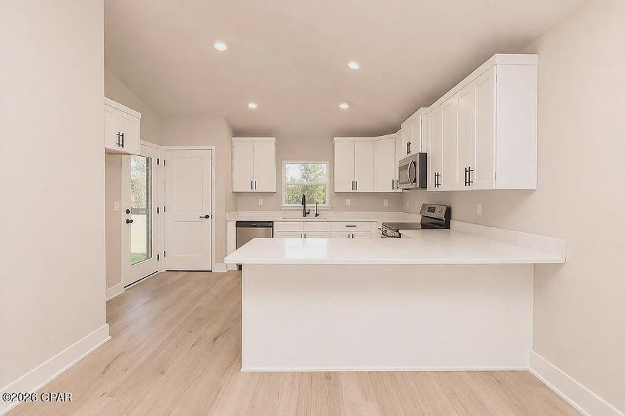 Furnished interior view inside a new home in College Station, Panama City (Image 6).