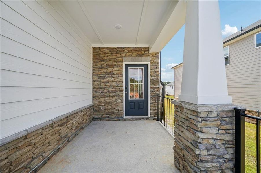 Exterior details and patio area of a home in Martin Springs - Reserve Series, Lawrenceville (Image 20).