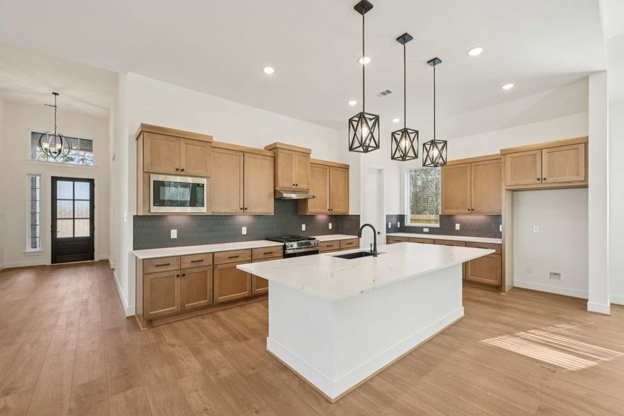 Furnished interior view inside a new home in The Woodlands Hills, Willis (Image 9).
