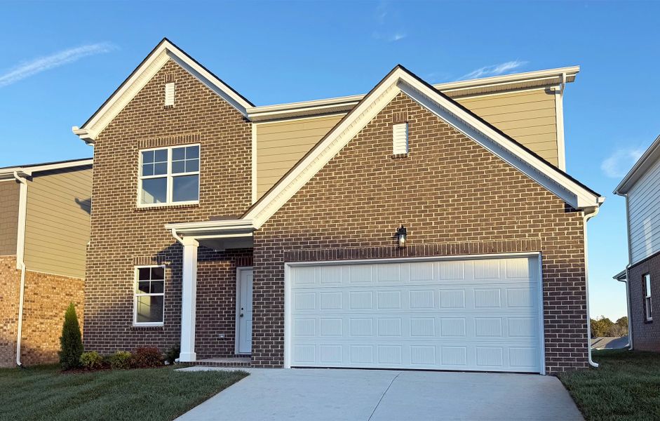 Front exterior of a new home in Cades Bluff, Lebanon, TN, highlighting curb appeal (Image 2). Front exterior of a new home in Cades Bluff, Lebanon, TN, highlighting curb appeal (Image 2).