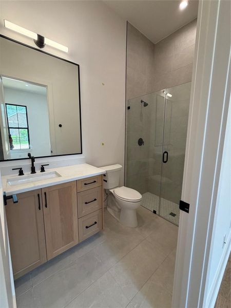 One of 5 baths with shower One of 5 baths with shower