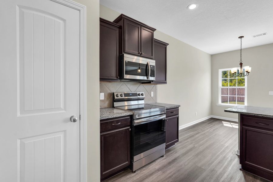 Representative furnished interior of a home built from the The Morris by RTS Homes in Grand Reserve, Hinesville (Image 11).