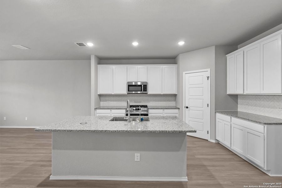 Furnished interior view inside a new home in Comanche Ridge, San Antonio (Image 28). Furnished interior view inside a new home in Comanche Ridge, San Antonio (Image 28).