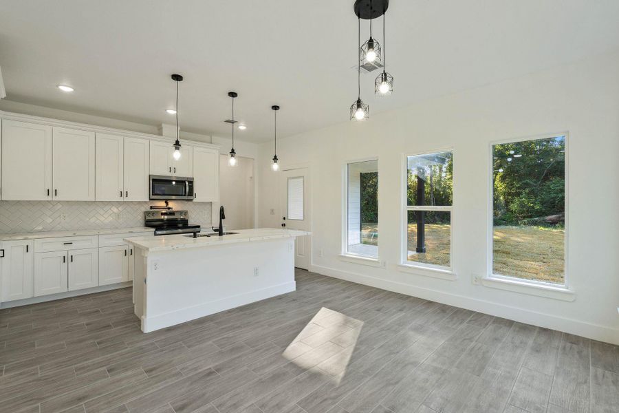 Furnished interior view inside a new home in , Willis (Image 6). Furnished interior view inside a new home in , Willis (Image 6).