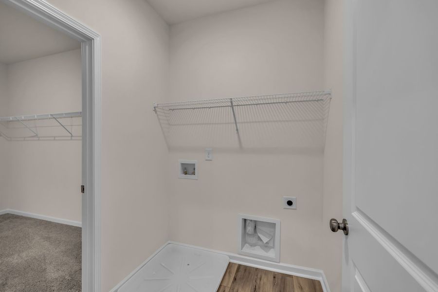 Laundry room with access to your primary walk in closet! Laundry room with access to your primary walk in closet!