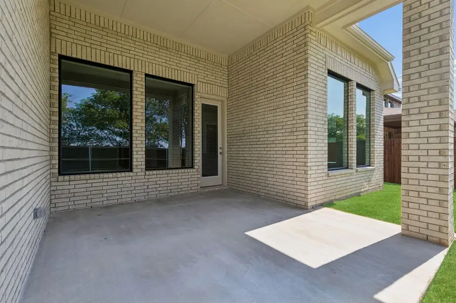 Front exterior of a new home in Parkmont – Timberbrook, Justin, TX, highlighting curb appeal (Image 31). Front exterior of a new home in Parkmont – Timberbrook, Justin, TX, highlighting curb appeal (Image 31).