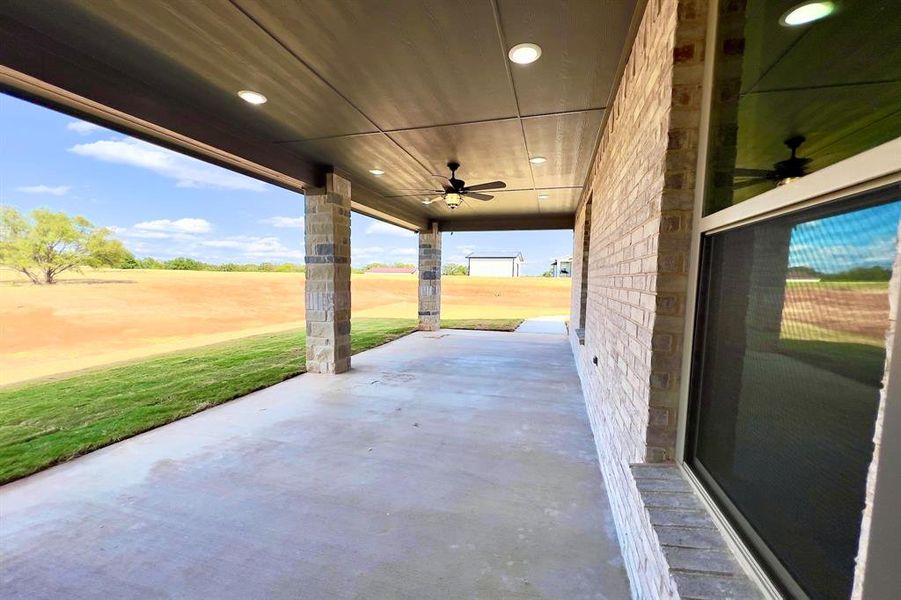 View of patio / terrace featuring ceiling fan