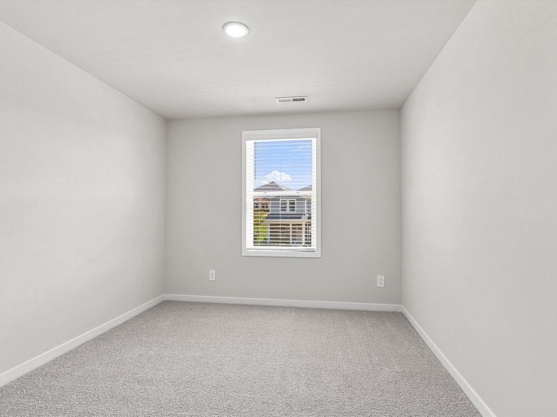 Spacious, unfurnished interior of a new home in The Heritage at Buffaloe Reserve, Raleigh (Image 18).