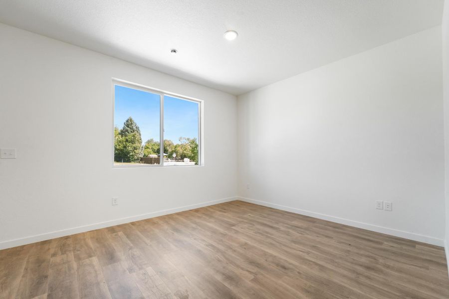 Spacious, unfurnished interior of a new home in Conestoga, Ault (Image 12).