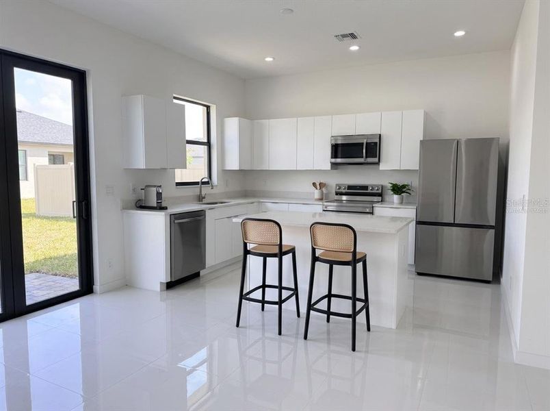 Furnished interior view inside a new home in , Cape Coral (Image 10). Furnished interior view inside a new home in , Cape Coral (Image 10).