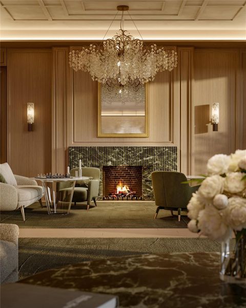 Also on the 18th floor is the grand lounge, featuring a striking fireplace and a fully equipped kitchen designed for hosting events and private gatherings. The level includes two meeting rooms and a conference room to accommodate business needs, along with a terrace off the lounge offering exceptional city views.