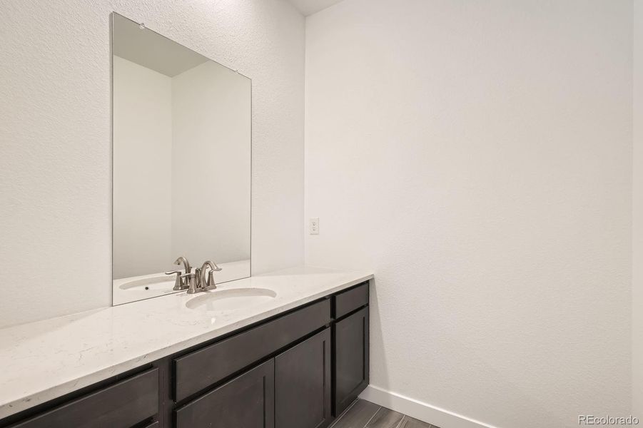 Furnished interior view inside a new home in Sunset Village: The Grand Collection, Erie (Image 8). Furnished interior view inside a new home in Sunset Village: The Grand Collection, Erie (Image 8).