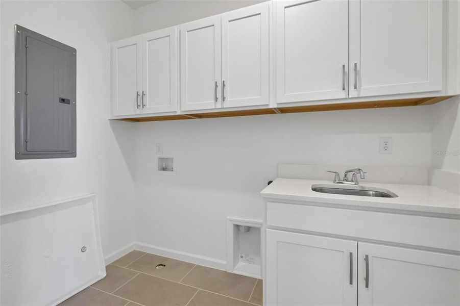 Furnished interior view inside a new home in Serenade at Ovation, Winter Garden (Image 12).