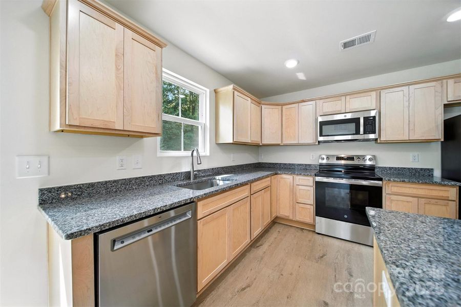 Furnished interior view inside a new home in , Hickory (Image 15).