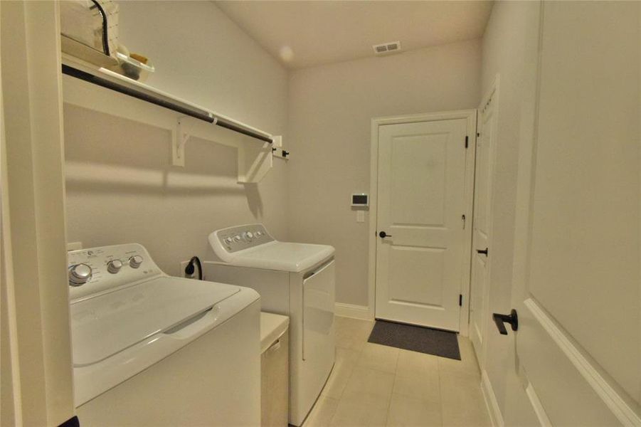 Furnished interior view inside a new home in Abe's Landing, Granbury (Image 29).