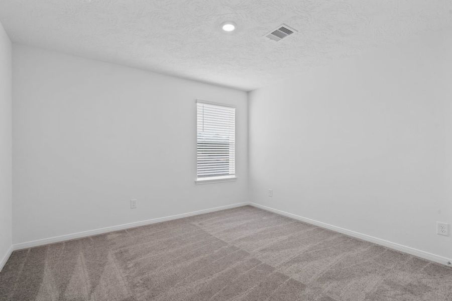Spacious, unfurnished interior of a new home in Grace Landing, Willis (Image 22).
