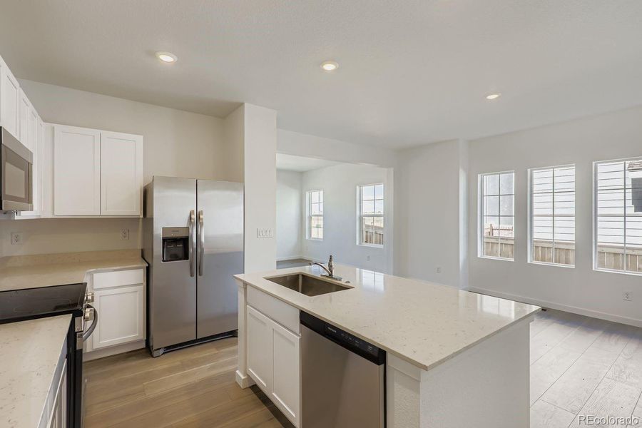 Furnished interior view inside a new home in , Thornton (Image 8).