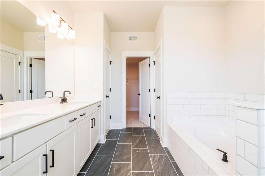 Furnished interior view inside a new home in The Paddocks at Doc Hughes, Buford (Image 3).