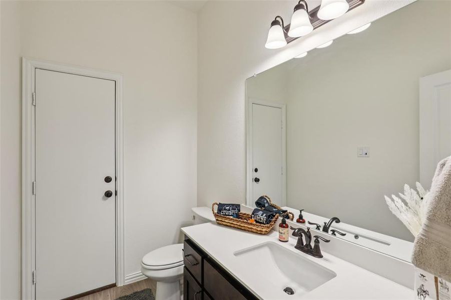 Half Bathroom that leads to outside as well.