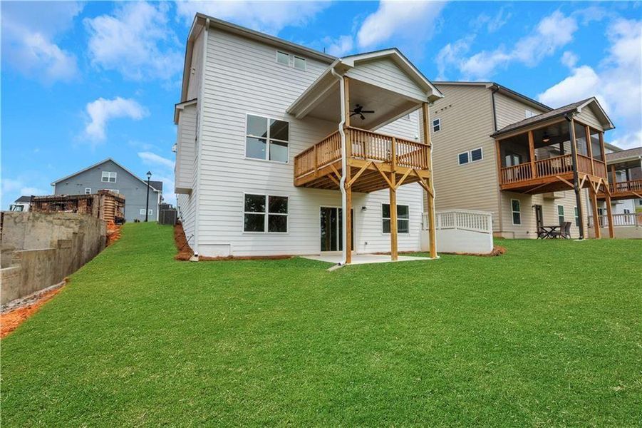 Front exterior of a new home in Twin Lakes, Hoschton, GA, highlighting curb appeal (Image 25). Front exterior of a new home in Twin Lakes, Hoschton, GA, highlighting curb appeal (Image 25).