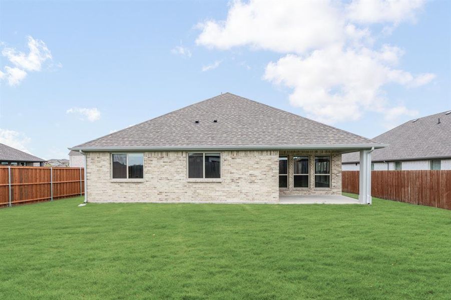 Front exterior of a new home in Heartland Classic 60, Crandall, TX, highlighting curb appeal (Image 24).
