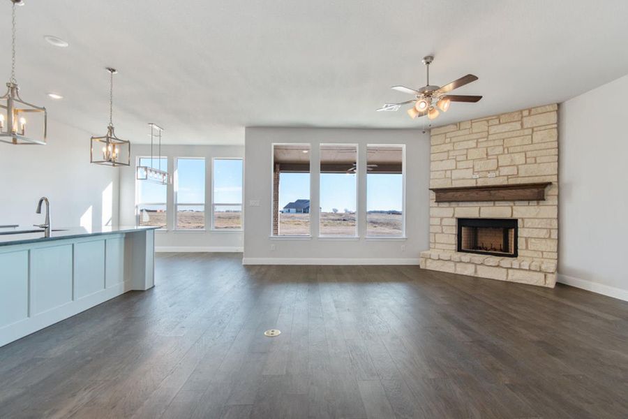 Family Room | Concept 2406 at The Meadows in Gunter, TX by Landsea Homes