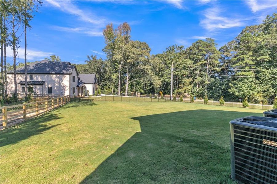 Front exterior of a new home in , Lawrenceville, GA, highlighting curb appeal (Image 22). Front exterior of a new home in , Lawrenceville, GA, highlighting curb appeal (Image 22).