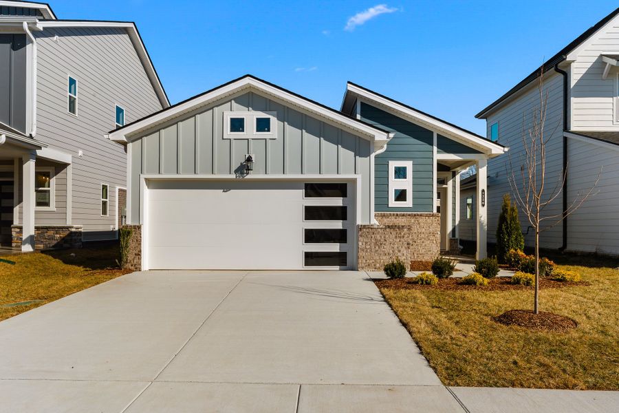 Front exterior of a new home in Nexus – Park Collection, Gallatin, TN, highlighting curb appeal (Image 2).